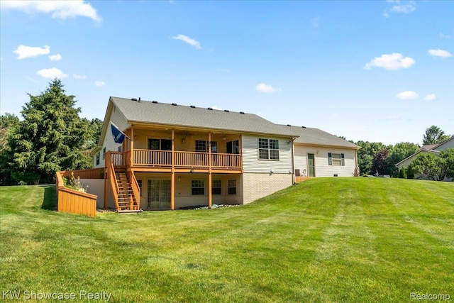 5037 Scheuners Way, Howell, MI 48843 - back of house featuring stairway, a wooden deck, and a yard
