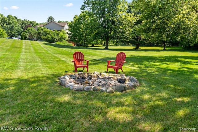 5037 Scheuners Way, Howell, MI 48843 - view of green lawn featuring an outdoor fire pit