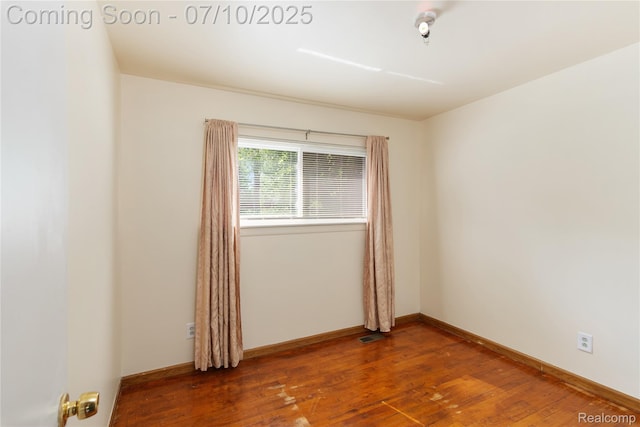 1684 Smith St, Ypsilanti, MI 48198 - unfurnished room with wood finished floors and baseboards