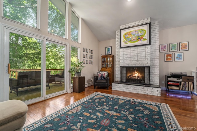 4729 Curtis Ln, Clarkston, MI 48346 - living area featuring a fireplace, high vaulted ceiling, a baseboard radiator, and wood-type flooring