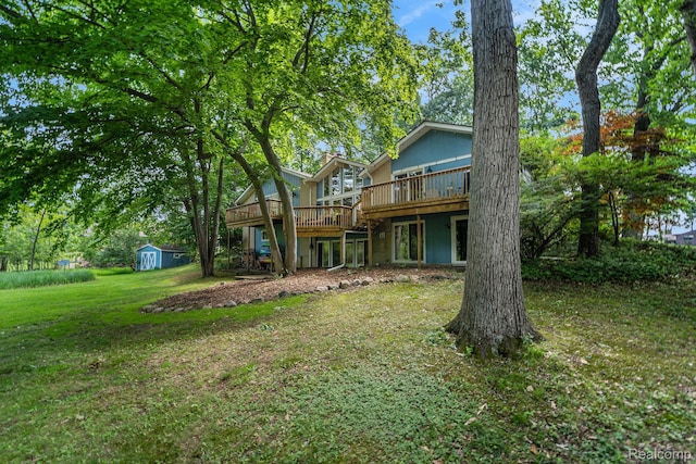 4729 Curtis Ln, Clarkston, MI 48346 - back of house featuring a deck, a shed, and a lawn