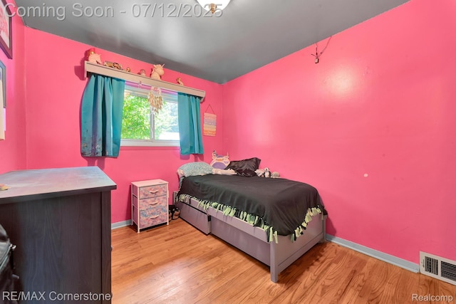 34060 Avondale St, Westland, MI 48186 - bedroom featuring wood finished floors