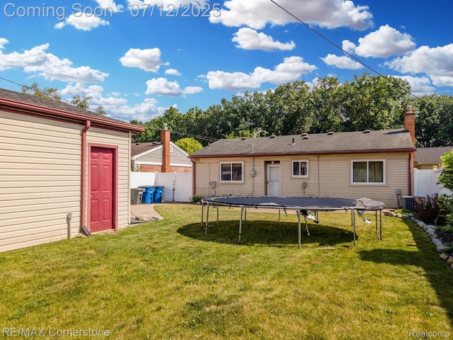 34060 Avondale St, Westland, MI 48186 - back of property featuring a trampoline