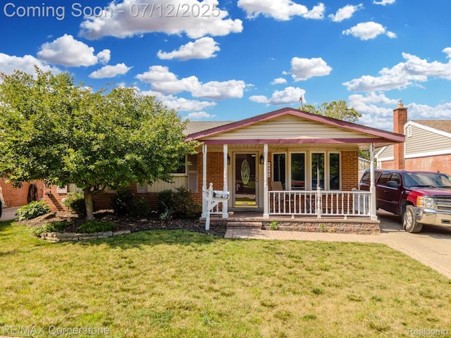 34060 Avondale St, Westland, MI 48186 - single story home with covered porch, brick siding, and a front yard