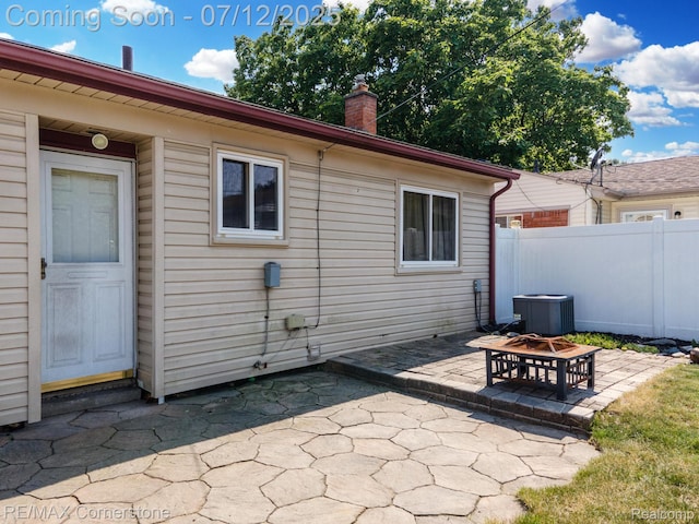 34060 Avondale St, Westland, MI 48186 - view of patio / terrace with an outdoor fire pit