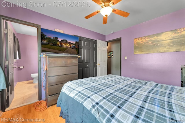 34060 Avondale St, Westland, MI 48186 - bedroom with wood finished floors, ceiling fan, and connected bathroom