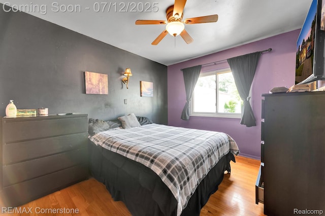 34060 Avondale St, Westland, MI 48186 - bedroom with light wood finished floors and ceiling fan