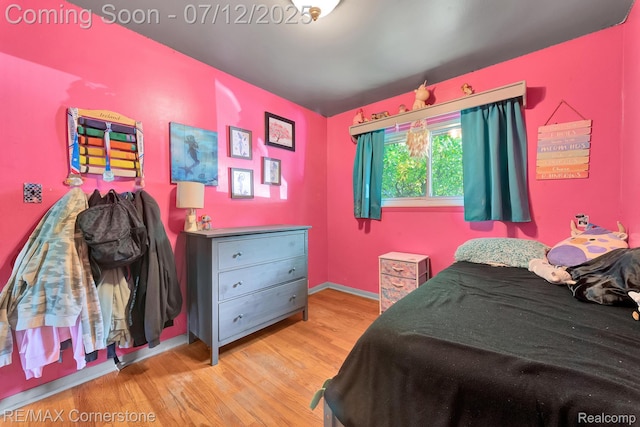 34060 Avondale St, Westland, MI 48186 - bedroom with wood finished floors and baseboards