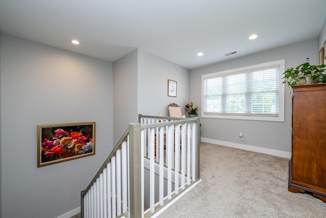 4785 Lauren Ln, Saint Joseph, MI 49085 - corridor featuring an upstairs landing, recessed lighting, and carpet floors