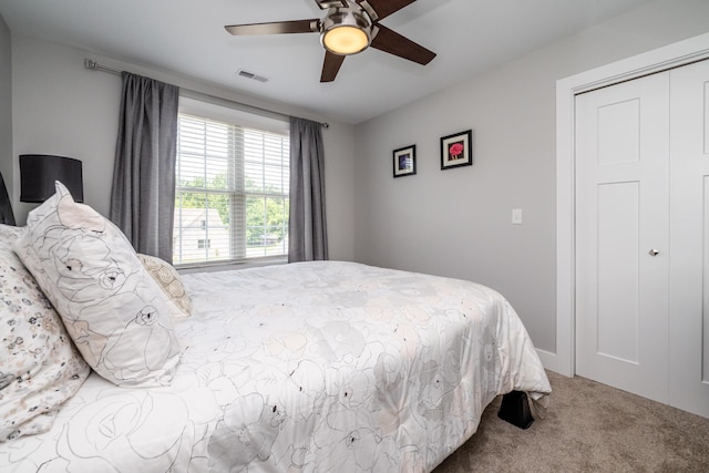 4785 Lauren Ln, Saint Joseph, MI 49085 - carpeted bedroom with a ceiling fan and a closet