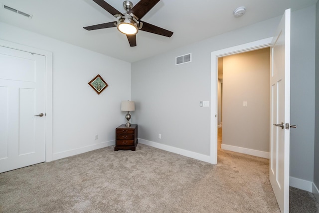 4785 Lauren Ln, Saint Joseph, MI 49085 - unfurnished bedroom with carpet floors and a ceiling fan