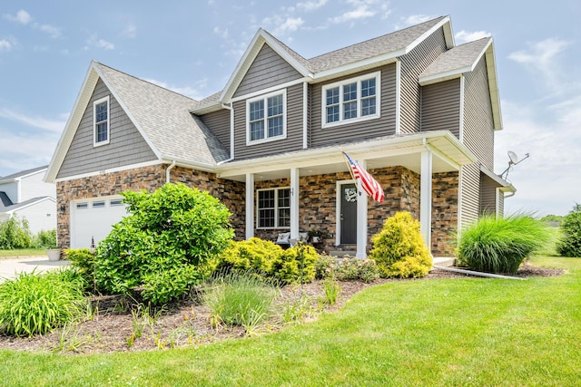 4785 Lauren Ln, Saint Joseph, MI 49085 - view of front of home with a garage, stone siding, a porch, a front lawn, and roof with shingles