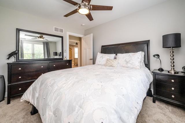 4785 Lauren Ln, Saint Joseph, MI 49085 - carpeted bedroom with a ceiling fan