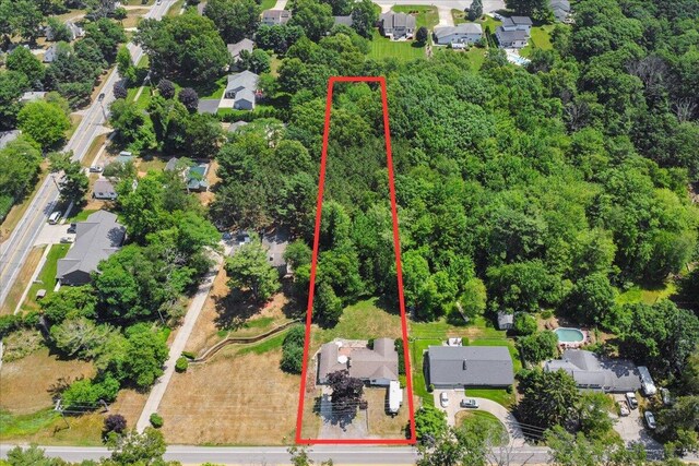 3658 Lake Harbor Rd, Norton Shores, MI 49441 - aerial view of residential area featuring property boundaries highlighted