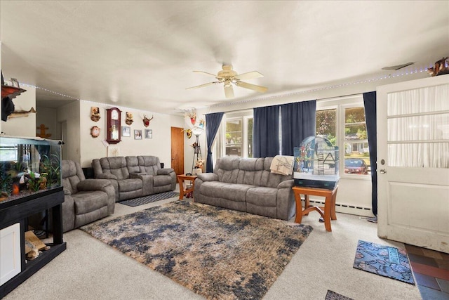 3658 Lake Harbor Rd, Norton Shores, MI 49441 - living area with ceiling fan, baseboard heating, and carpet floors