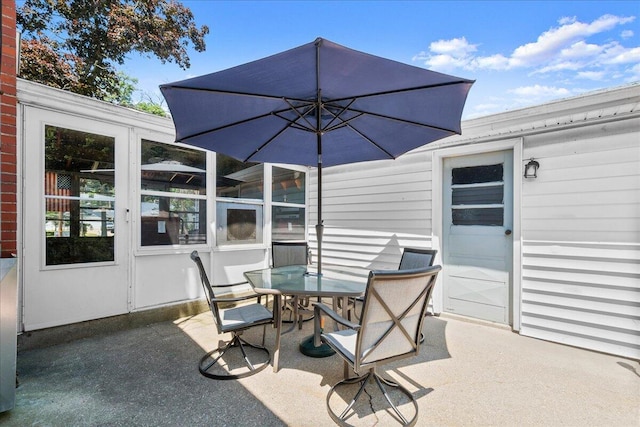 3658 Lake Harbor Rd, Norton Shores, MI 49441 - view of patio / terrace featuring outdoor dining space