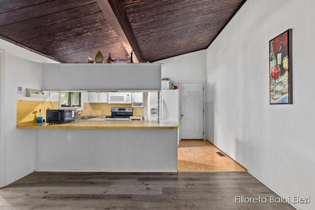 5640 Kraft Ave SE, Grand Rapids, MI 49512 - kitchen featuring wooden ceiling, white microwave, stainless steel electric range, black microwave, and a peninsula