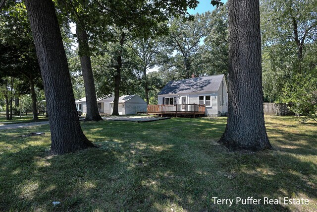 2025 Whitehall Rd, Muskegon, MI 49445 - view of yard featuring a wooden deck