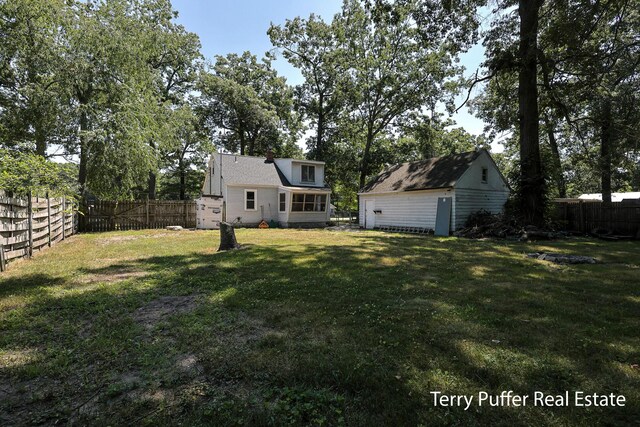 2025 Whitehall Rd, Muskegon, MI 49445 - fenced backyard featuring a shed