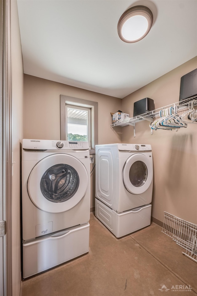 4646 Lehman Rd, West Branch, MI 48661 - laundry room featuring washing machine and dryer