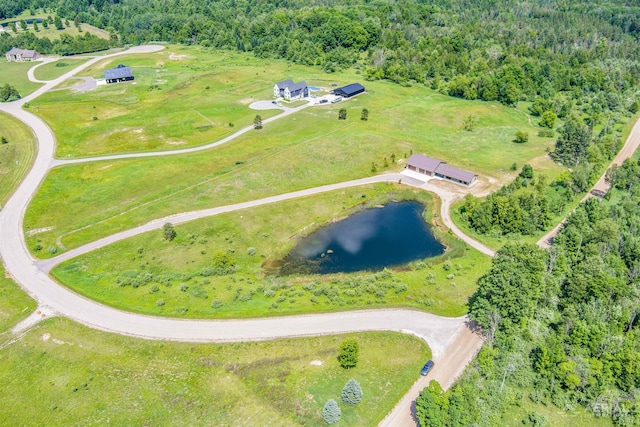 4646 Lehman Rd, West Branch, MI 48661 - aerial overview of property's location featuring a forest and a nearby body of water