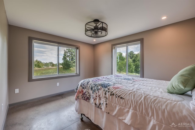 4646 Lehman Rd, West Branch, MI 48661 - bedroom with concrete floors and recessed lighting