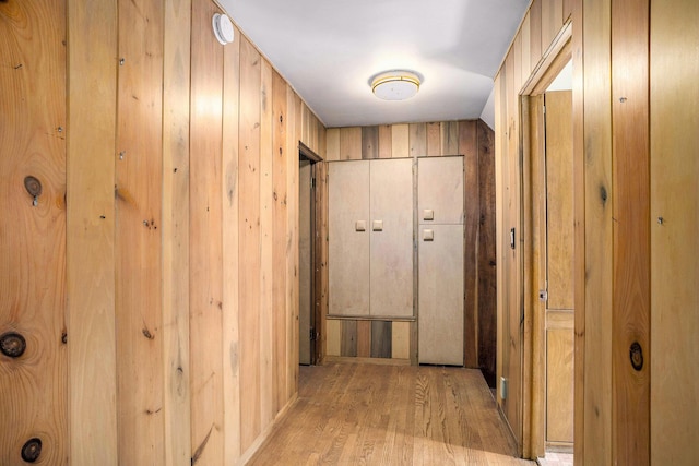 929 N Park Rd, Benton Harbor, MI 49022 - hall featuring light wood-style floors and wooden walls
