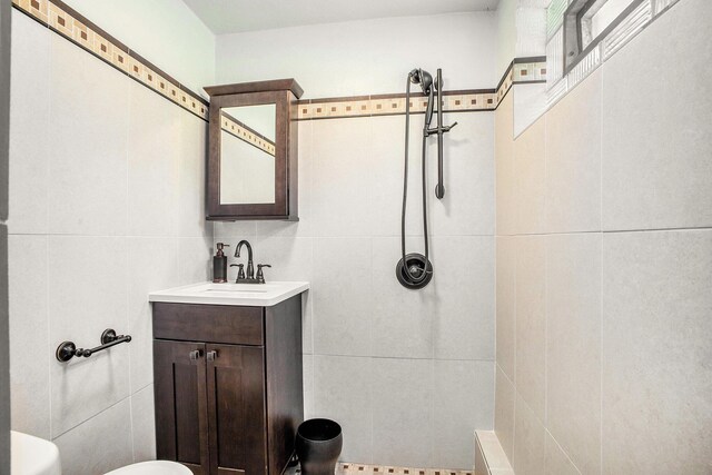 929 N Park Rd, Benton Harbor, MI 49022 - bathroom with tile walls and vanity