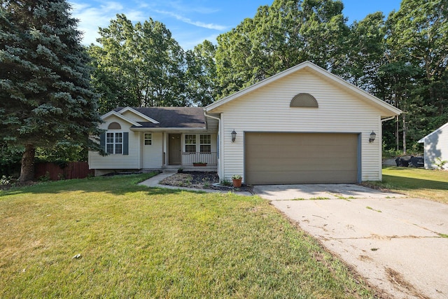 1972 Red Pine Dr, Dorr, MI 49323 - single story home with an attached garage, driveway, and a porch