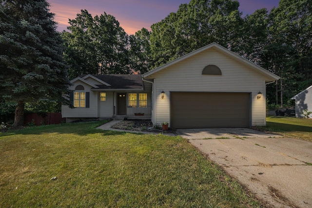1972 Red Pine Dr, Dorr, MI 49323 - ranch-style house with driveway, a garage, and a porch