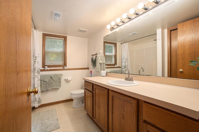 1972 Red Pine Dr, Dorr, MI 49323 - bathroom featuring vanity, a shower with curtain, and tile patterned floors