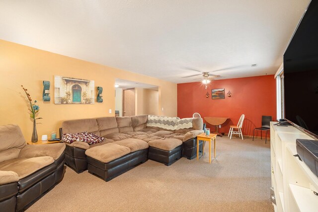 1972 Red Pine Dr, Dorr, MI 49323 - living room featuring carpet and a ceiling fan