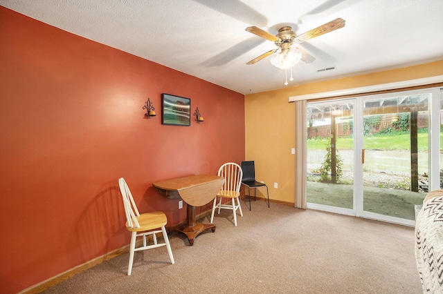 1972 Red Pine Dr, Dorr, MI 49323 - dining room with a ceiling fan and carpet floors