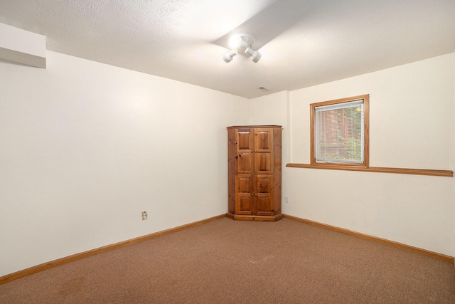 1972 Red Pine Dr, Dorr, MI 49323 - empty room featuring light carpet and baseboards