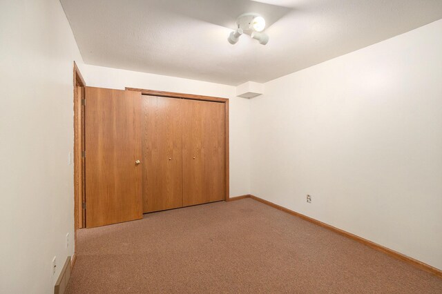 1972 Red Pine Dr, Dorr, MI 49323 - unfurnished bedroom with carpet floors and a closet