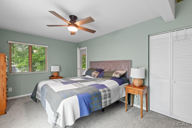 3129 Oakshade Dr, Manitou Beach, MI 49253 - carpeted bedroom with ceiling fan and a closet
