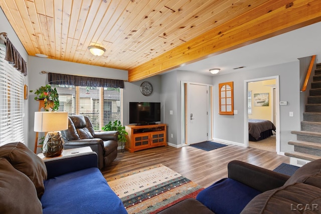3129 Oakshade Dr, Manitou Beach, MI 49253 - living area featuring stairway, wood finished floors, and wood ceiling
