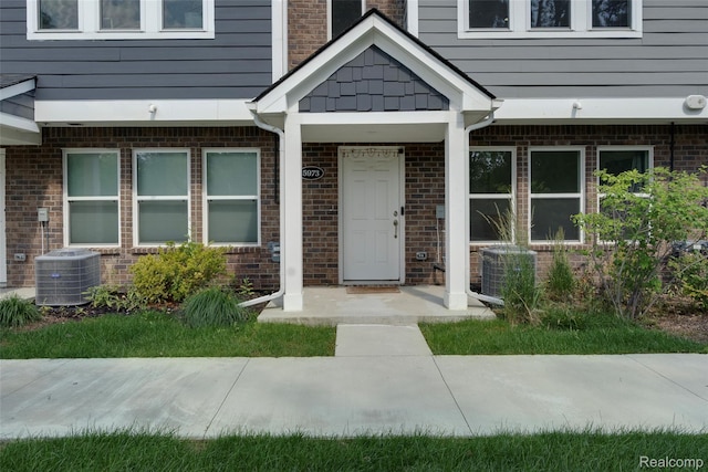 5973 Stella, Troy, MI 48085 - property entrance featuring brick siding