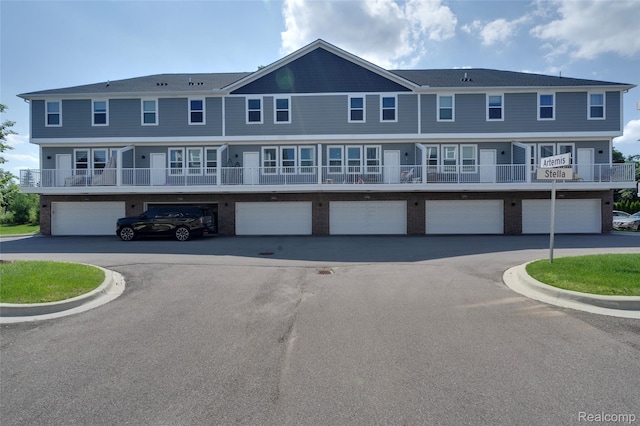 5973 Stella, Troy, MI 48085 - view of front facade featuring driveway