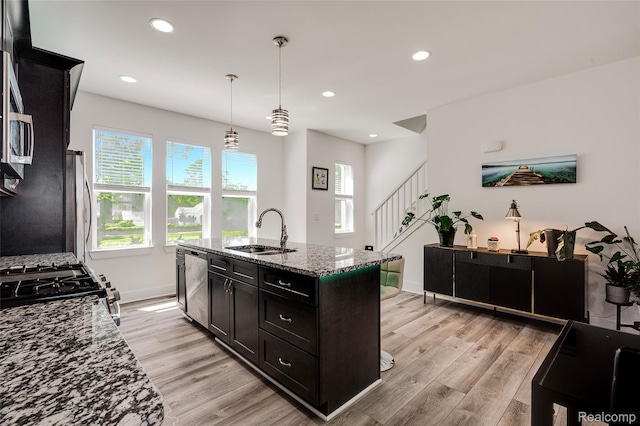 5973 Stella, Troy, MI 48085 - kitchen with dishwasher, stone counters, light wood-style floors, recessed lighting, and pendant lighting