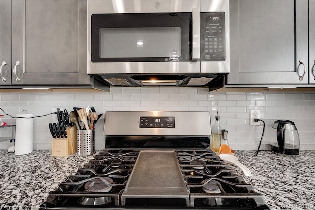 5973 Stella, Troy, MI 48085 - kitchen with stainless steel appliances and backsplash
