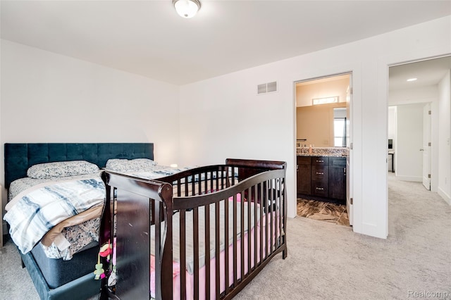 5973 Stella, Troy, MI 48085 - bedroom with light colored carpet and ensuite bathroom