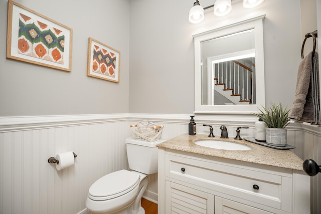 7226 Breton Woods Ct, Kalamazoo, MI 49009 - bathroom with vanity and wainscoting