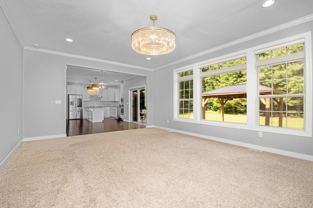 7226 Breton Woods Ct, Kalamazoo, MI 49009 - unfurnished living room featuring a chandelier, dark carpet, recessed lighting, and ornamental molding