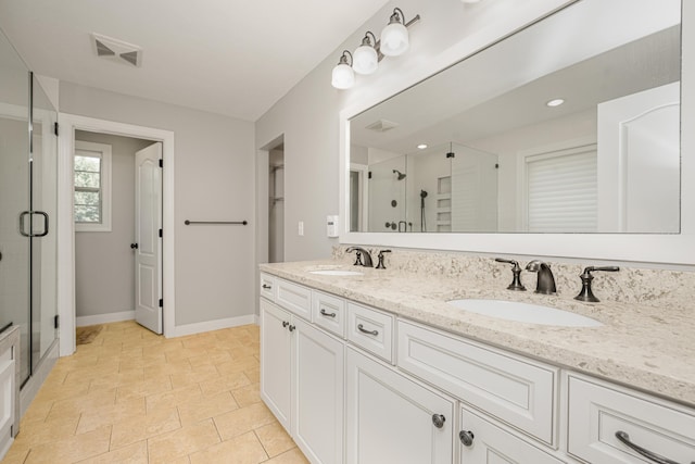 7226 Breton Woods Ct, Kalamazoo, MI 49009 - bathroom featuring a stall shower and double vanity