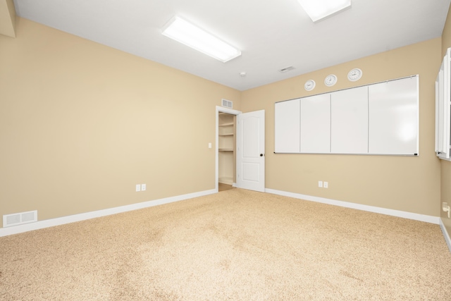 7226 Breton Woods Ct, Kalamazoo, MI 49009 - unfurnished bedroom featuring carpet flooring and baseboards