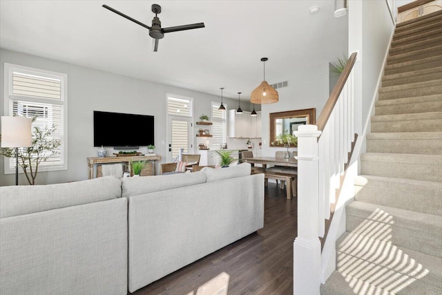 230 Cavelier Ave, Saint Joseph, MI 49085 - living room featuring dark wood-style flooring, a ceiling fan, and stairway