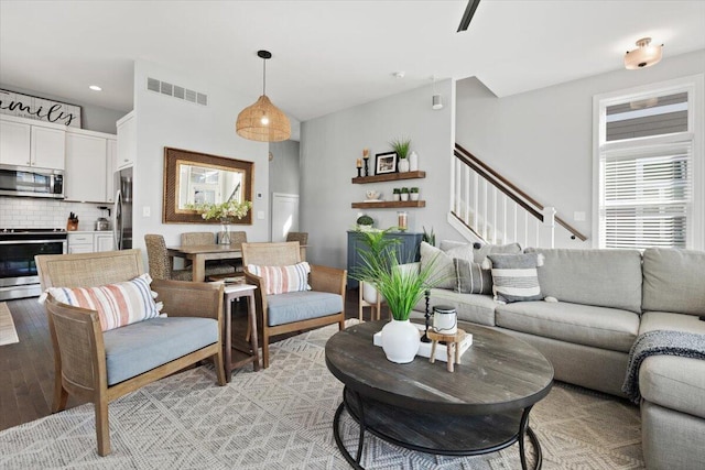 230 Cavelier Ave, Saint Joseph, MI 49085 - living room featuring stairs, light wood-style floors, and recessed lighting