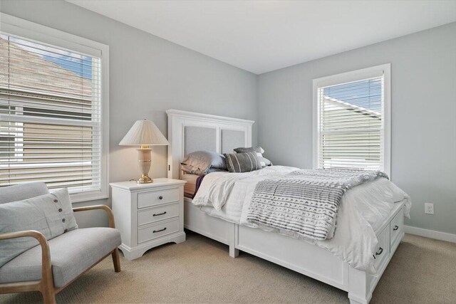 230 Cavelier Ave, Saint Joseph, MI 49085 - bedroom featuring light colored carpet