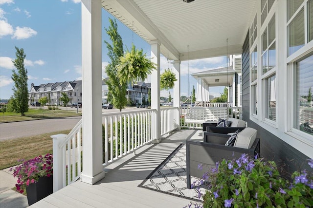 230 Cavelier Ave, Saint Joseph, MI 49085 - wooden porch with a residential view